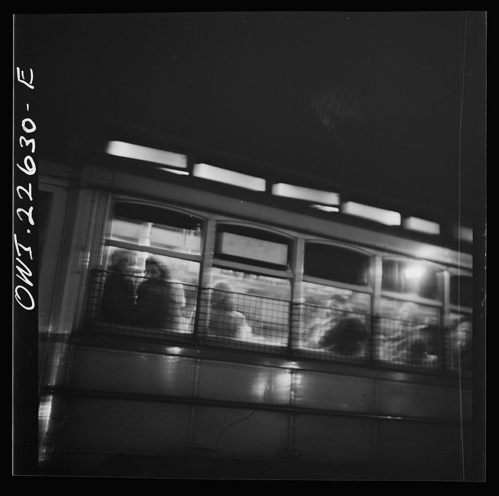 [Untitled photo, possibly related to: Baltimore, Maryland. Trolley carrying workers to the night shift at the Bethlehem…