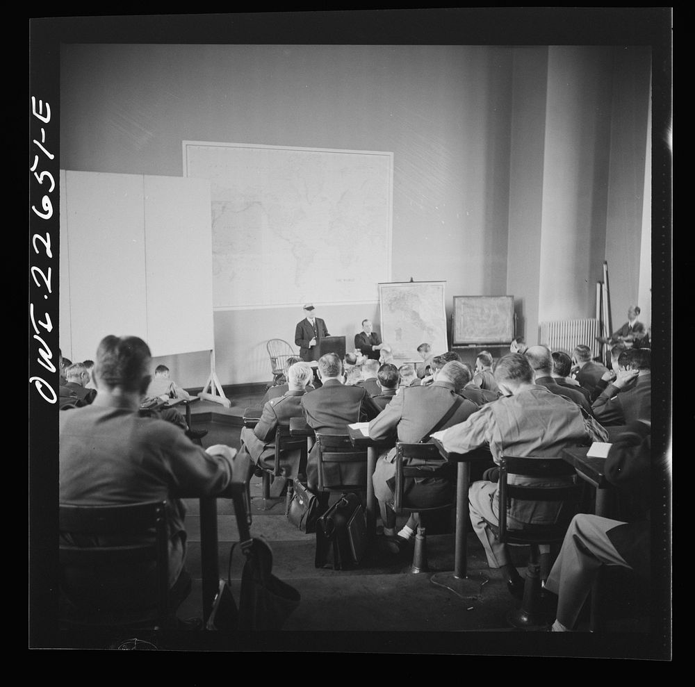 Charlottesville, Virginia. Civilian expert in banking addressing the student body of the School of Military Government at…