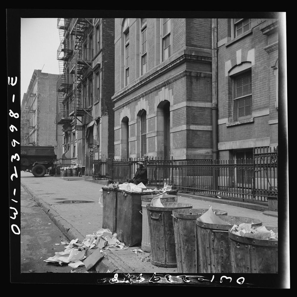 New York, New York. Street scene showing open trash cans along the curb. Sourced from the Library of Congress.