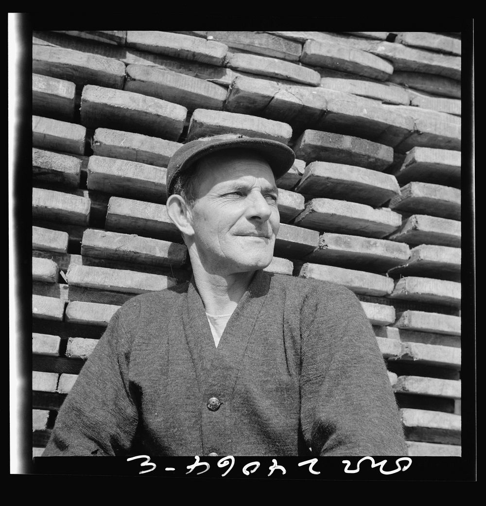 New York, New York. New England fisherman resting at the New York docks after unloading his cargo of fish. Sourced from the…