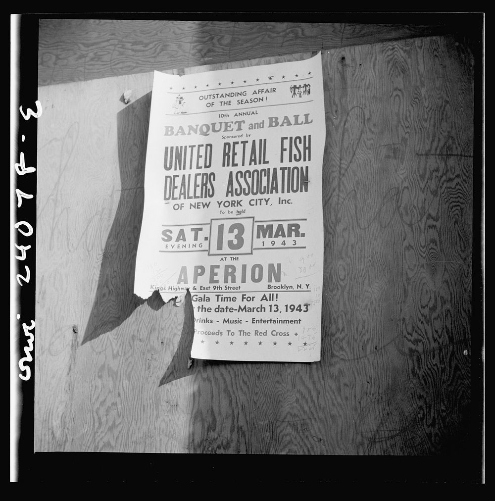 New York, New York. A sign at the Fulton fish market advertising a fish dealers' banquet and hall. Sourced from the Library…