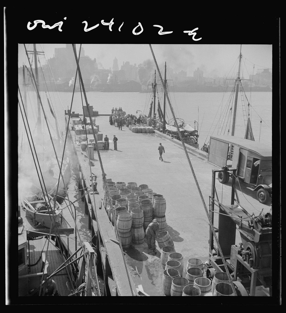 New York, New York. A scene at the Fulton fish market showing the dock where New England fishing boats unload their cargo.…