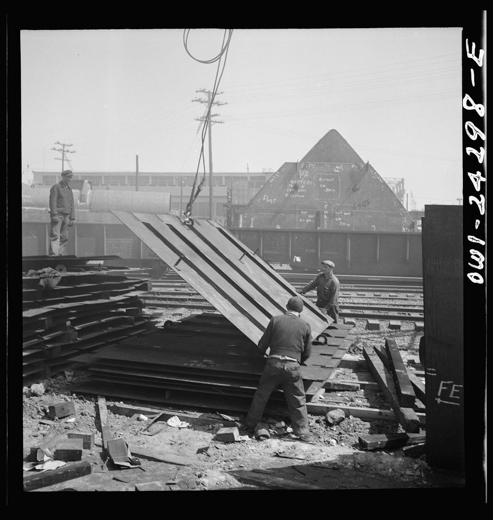 Bethlehem-Fairfield shipyards, Baltimore, Maryland. Storing miscellaneous bulkheads in a stockyard. Sourced from the Library…