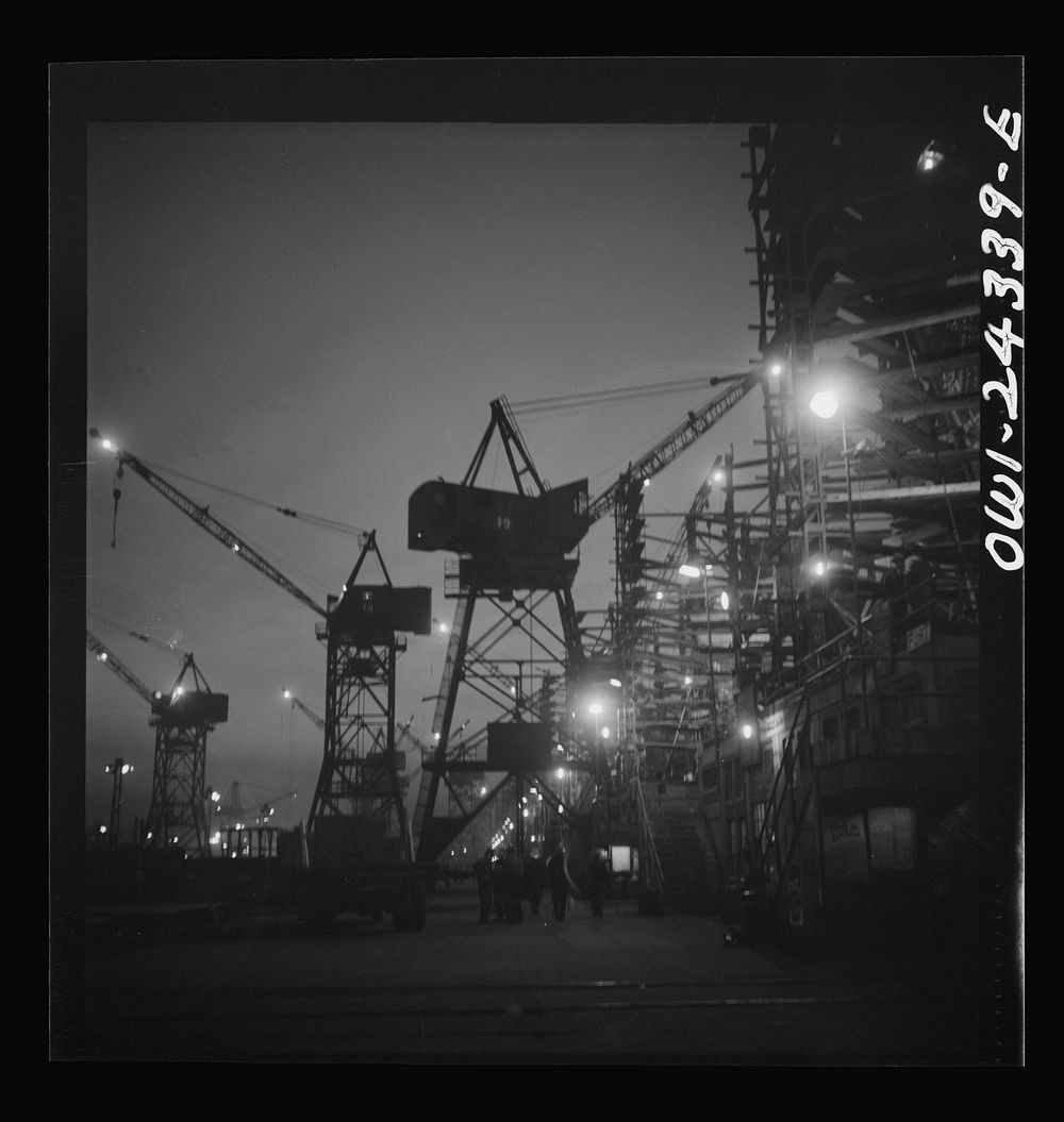 Bethlehem-Fairfield shipyards, Baltimore, Maryland. A night view looking toward the ways. Sourced from the Library of…