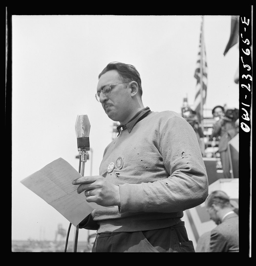 Bethlehem-Fairfield shipyards, Baltimore, Maryland. Union leader making an address at a launching ceremony. Sourced from the…
