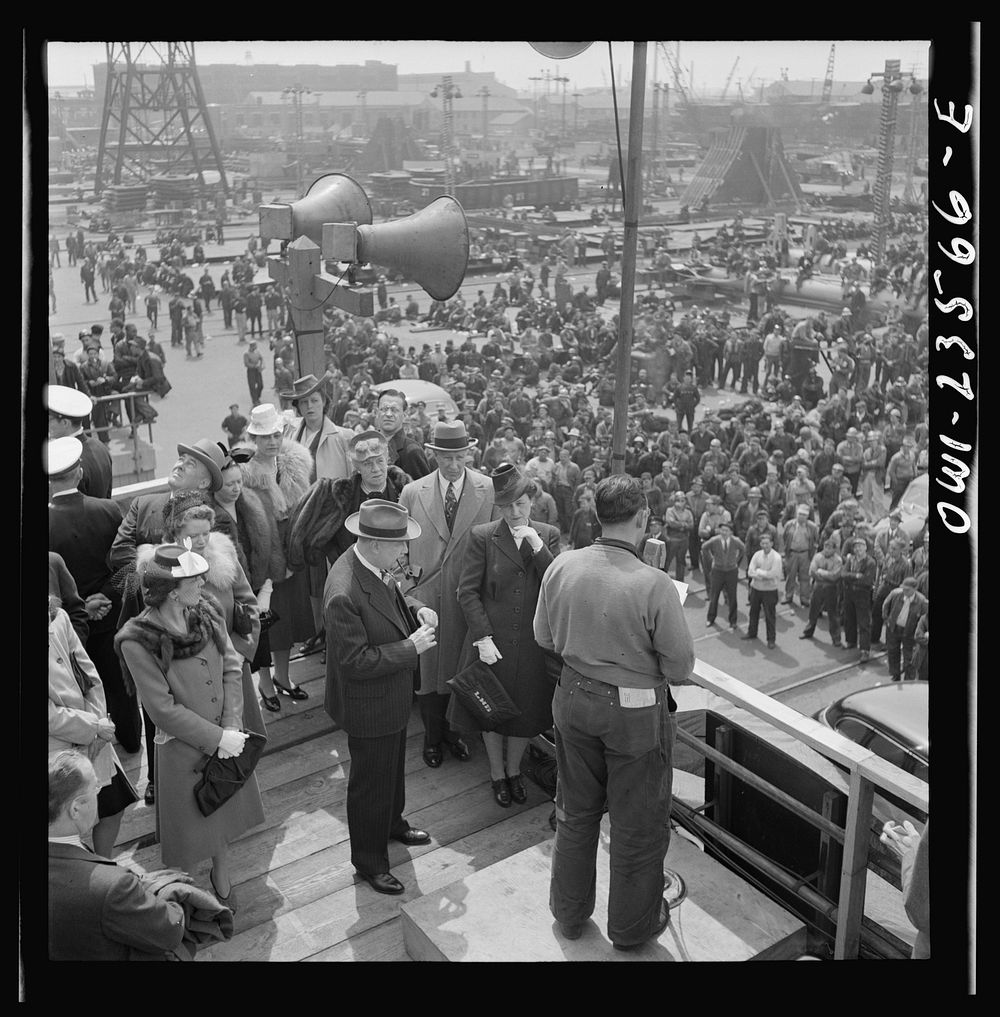 Bethlehem-Fairfield shipyards, Baltimore, Maryland. Union leader making an address at a launching ceremony. Sourced from the…