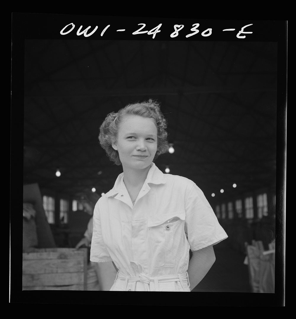 San Augustine, Texas. Girl at NYA (National Youth Administration) woodworking shop in the war training program. Sourced from…