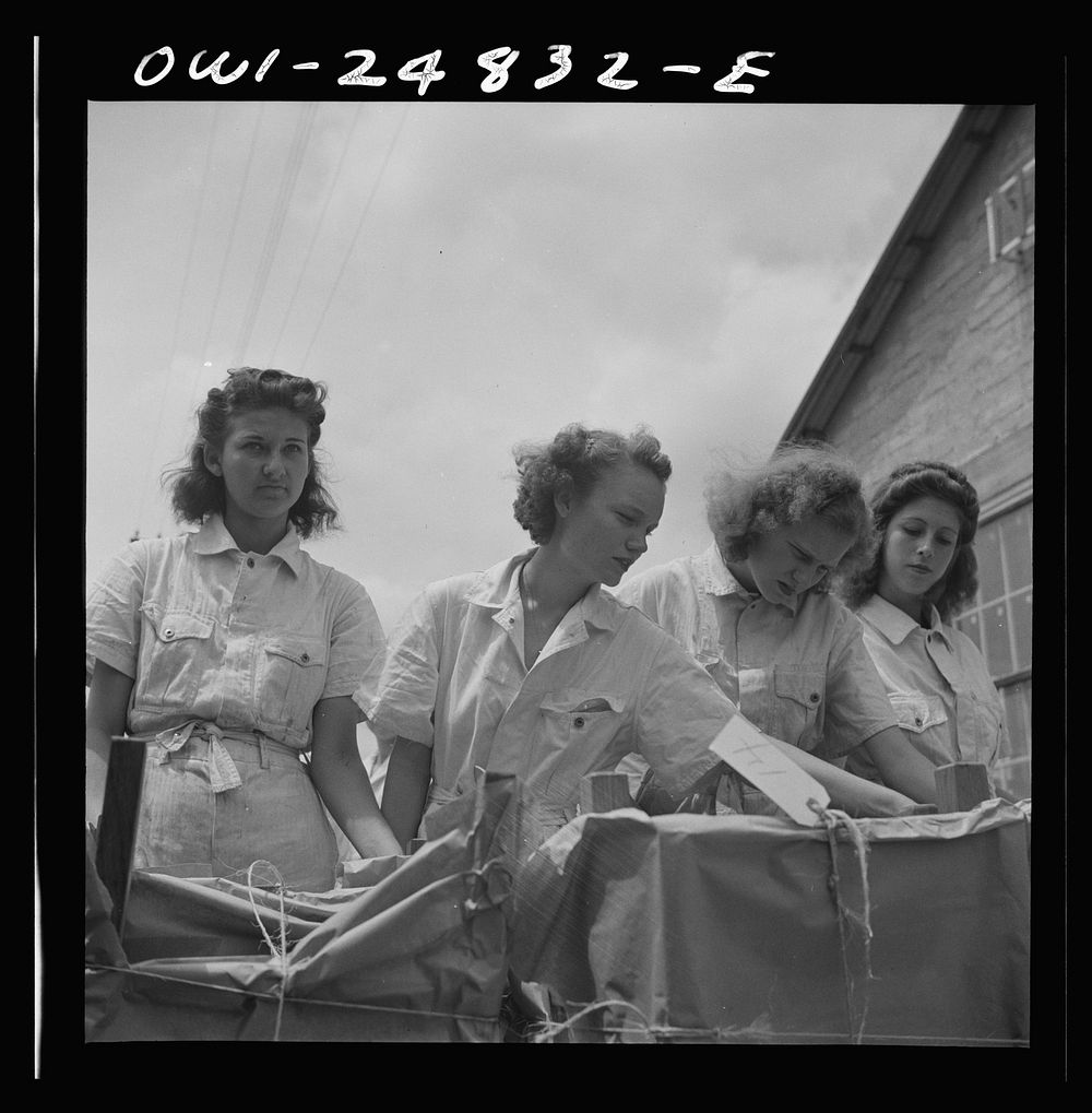 [Untitled photo, possibly related to: San Augustine, Texas. Girls with chairs they made in woodworking shop under the NYA…