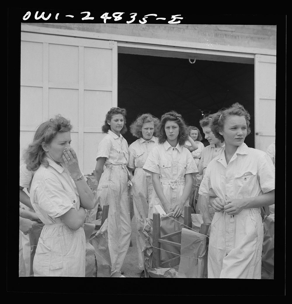 [Untitled photo, possibly related to: San Augustine, Texas. Girls with chairs they made in woodworking shop under the NYA…