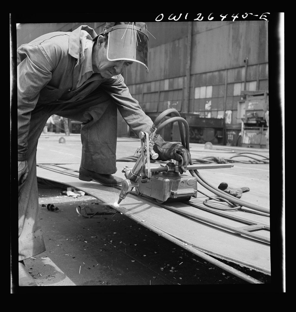 Bethlehem-Fairfield shipyards, Baltimore, Maryland. Burning off excess steel plate. Sourced from the Library of Congress.