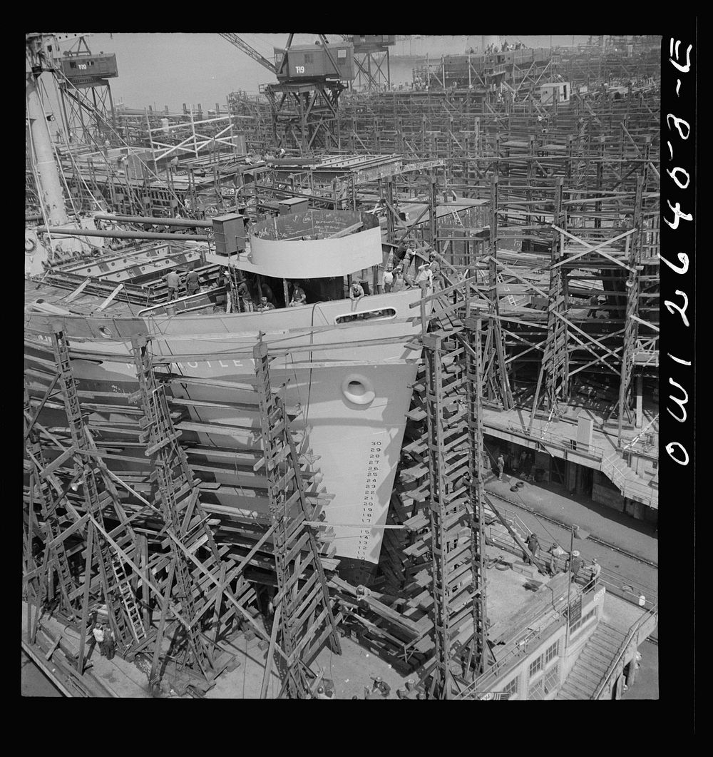 Bethlehem-Fairfield shipyards, Baltimore, Maryland. Forward section of a nearly completed ship. Sourced from the Library of…