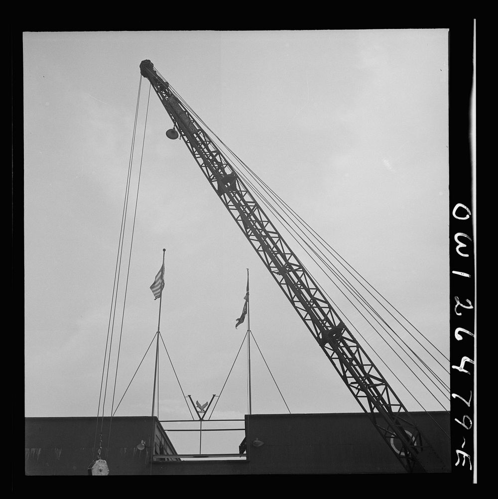 Bethlehem-Fairfield shipyards, Baltimore, Maryland. Room and flags in the shipyard. Sourced from the Library of Congress.