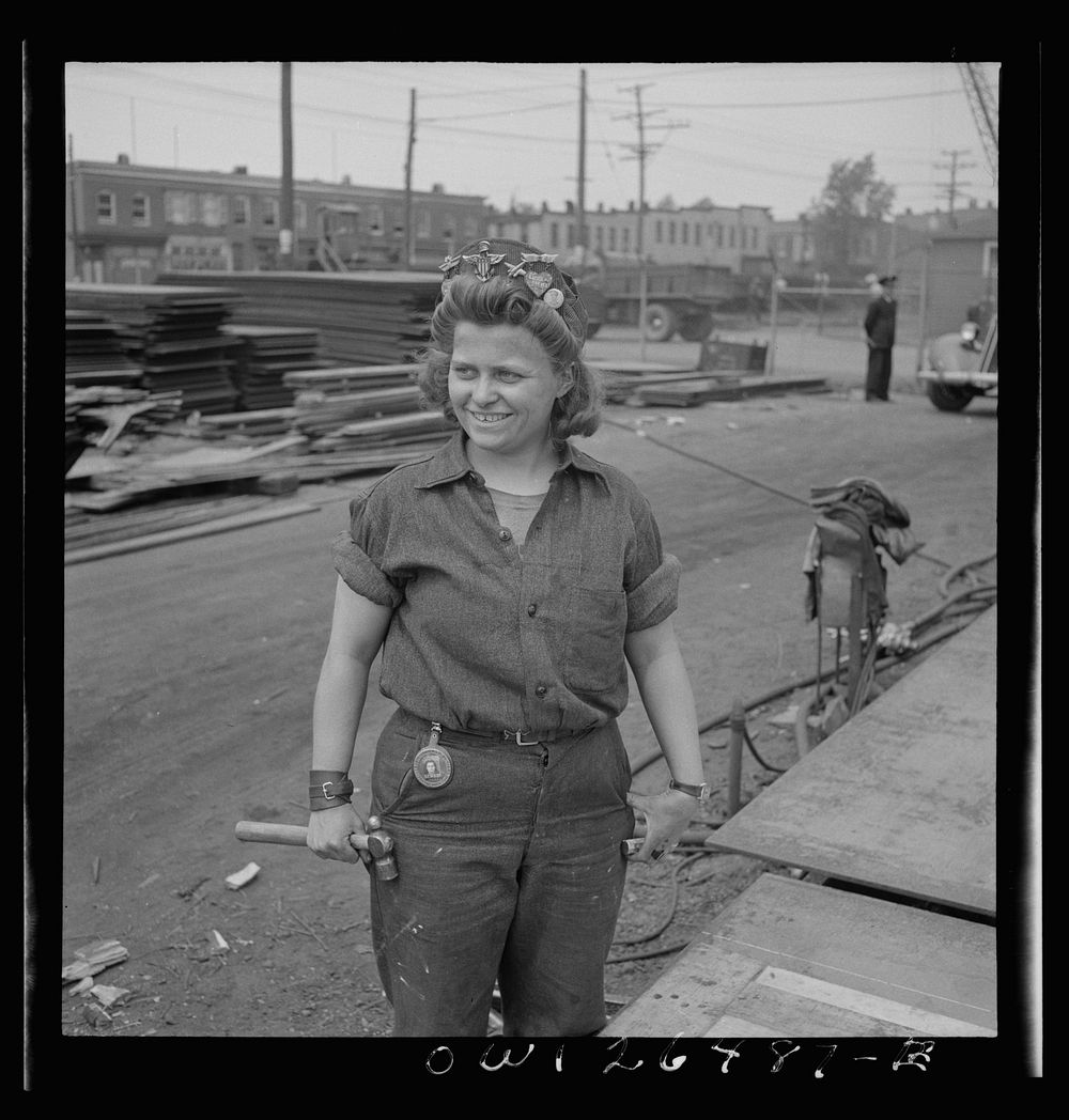 Bethlehem-Fairfield shipyards, Baltimore, Maryland. A sturdy girl worker with a hammer. Sourced from the Library of Congress.