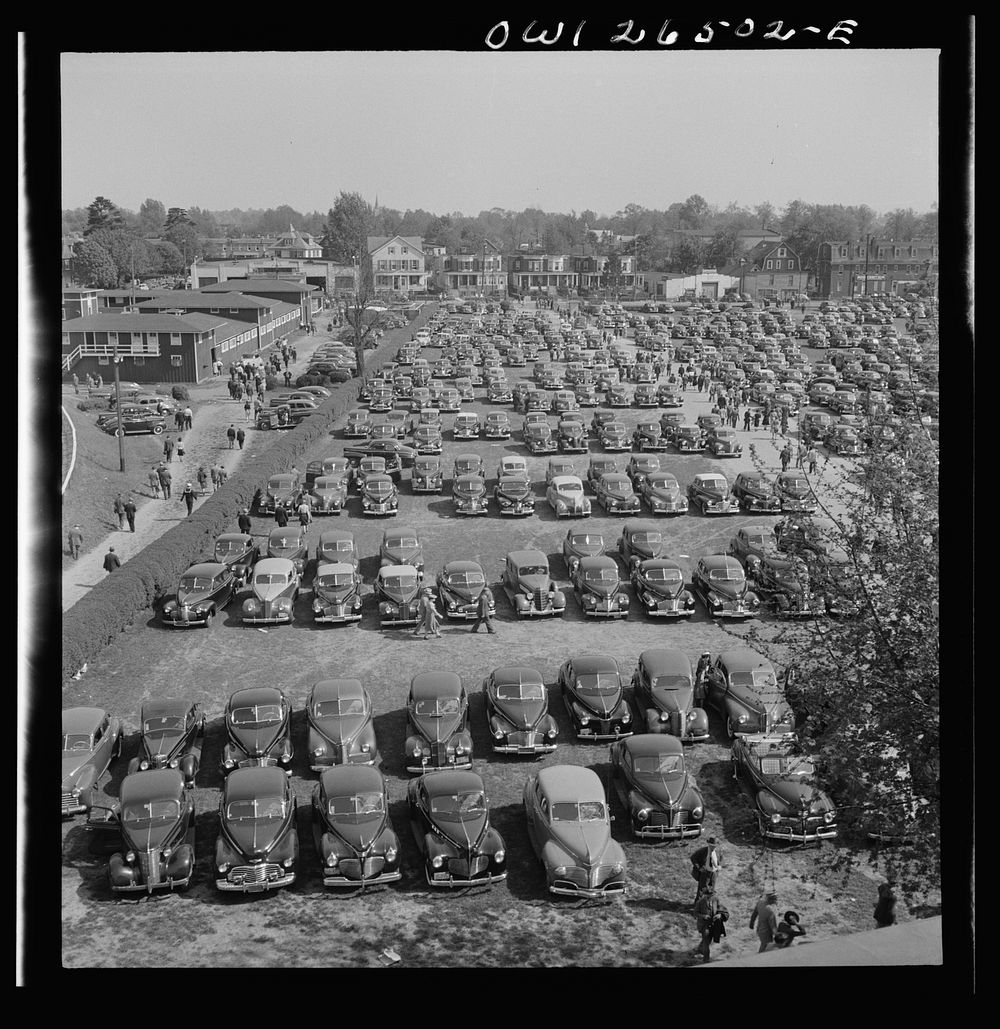 Pimlico racetrack, near Baltimore, Maryland. Parked cars at Pimlico in spite of gas ration. Sourced from the Library of…