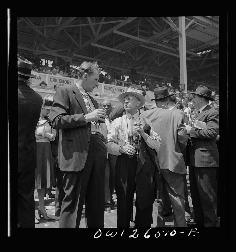 Pimlico racetrack, near Baltimore, Maryland. Racetrack fans at Pimlico. Sourced from the Library of Congress.