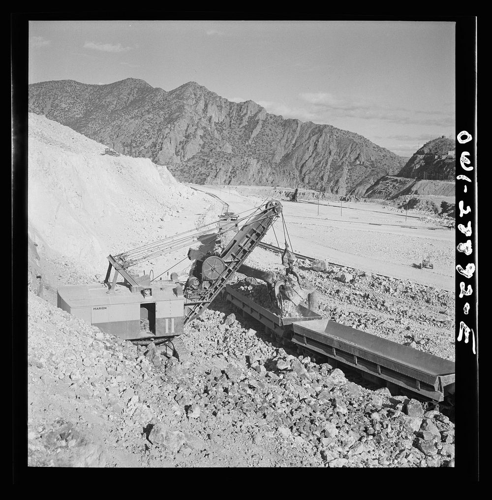 Morenci, Arizona. Loading copper ore from an open-pit mine into ore cars which transport the ore to the smelter plant at the…