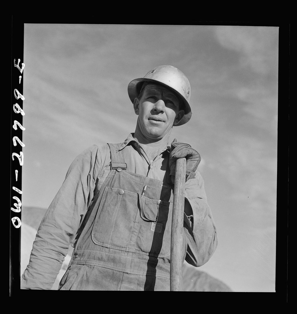 [Untitled photo, possibly related to: Morenci, Arizona. Bulldozer operator at an open-pit copper mine of the Phelps Dodge…