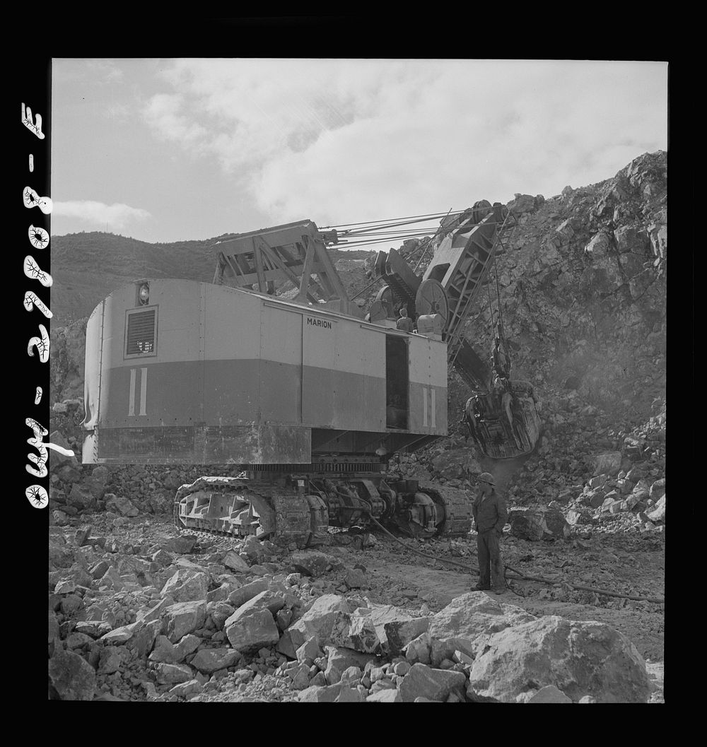 [Untitled photo, possibly related to: Morenci, Arizona. A huge electric shovel in operation at an open-pit copper mine of…