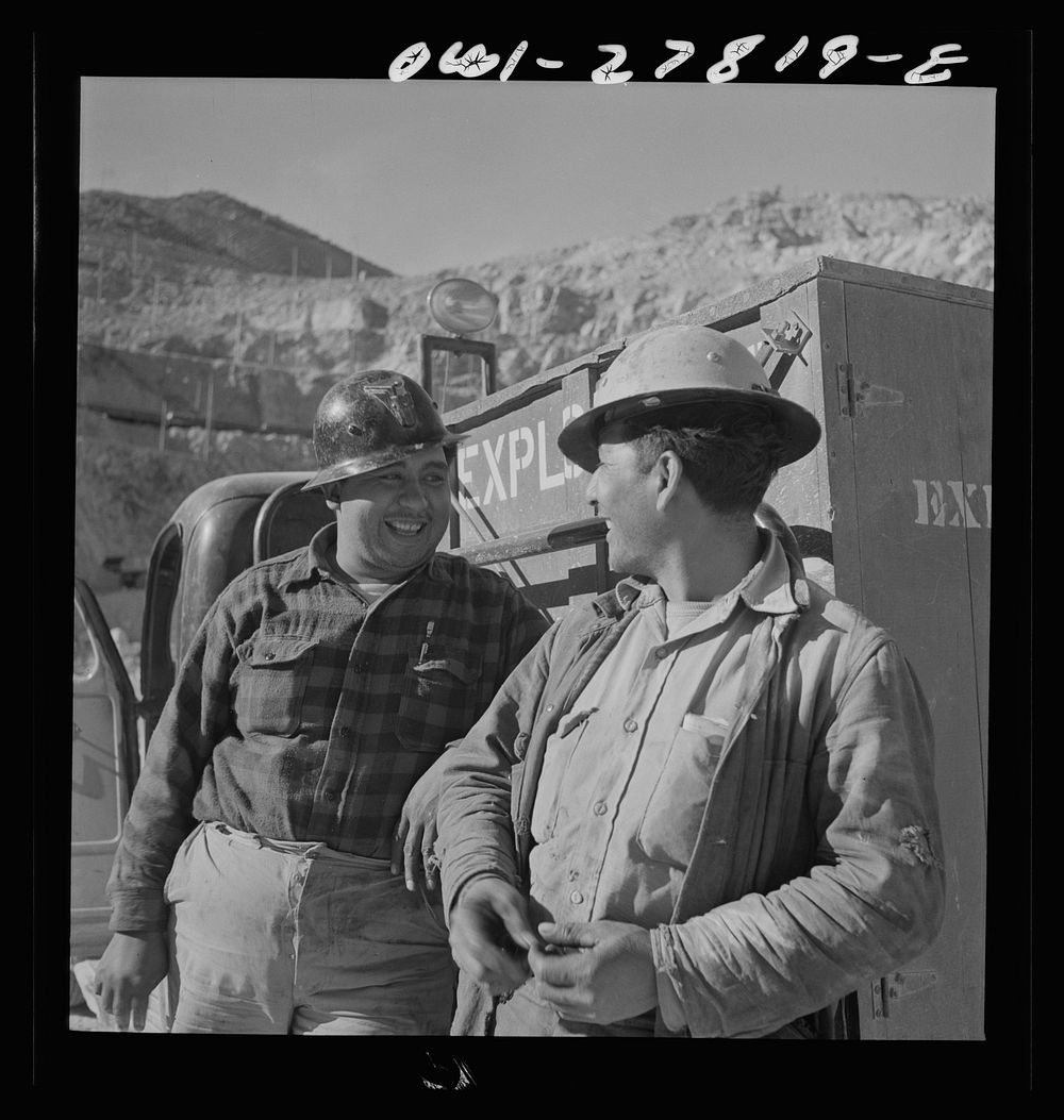 Morenci, Arizona. Three handy workers transport and dispense the explosives used for blasting at a large open-pit copper…