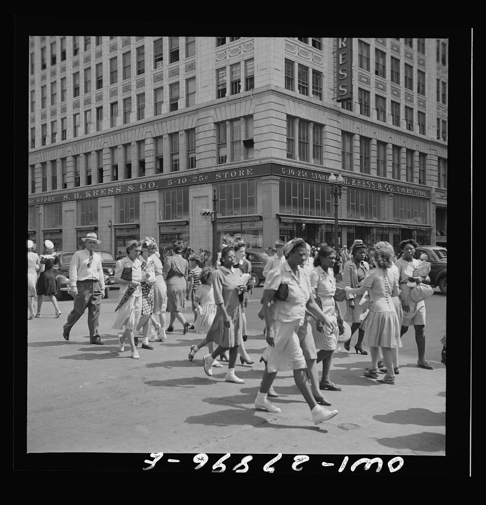 Houston, Texas. People crossing a downtown street with the green light. Sourced from the Library of Congress.