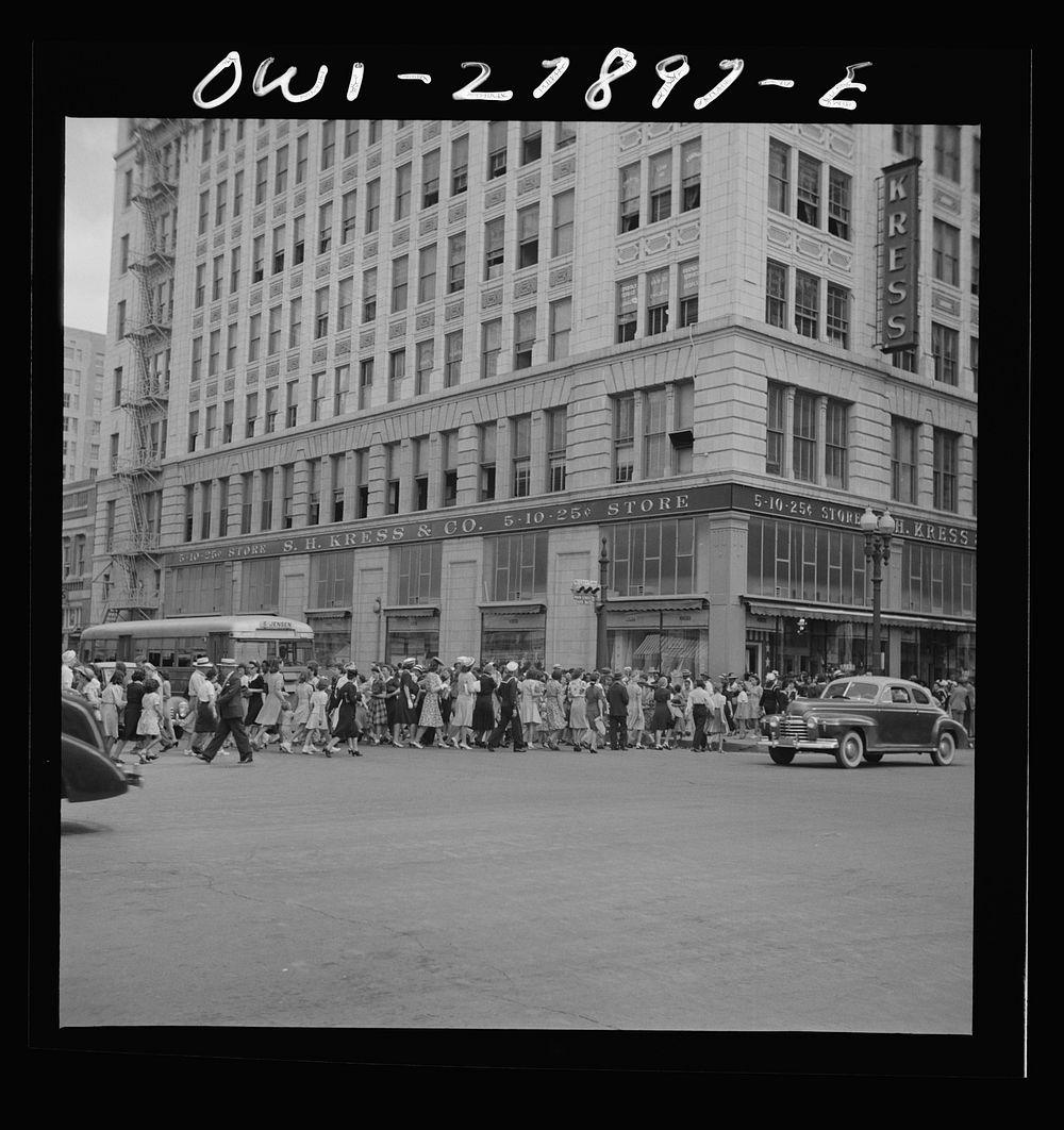 Houston, Texas. People crossing a downtown street with the green light. Sourced from the Library of Congress.