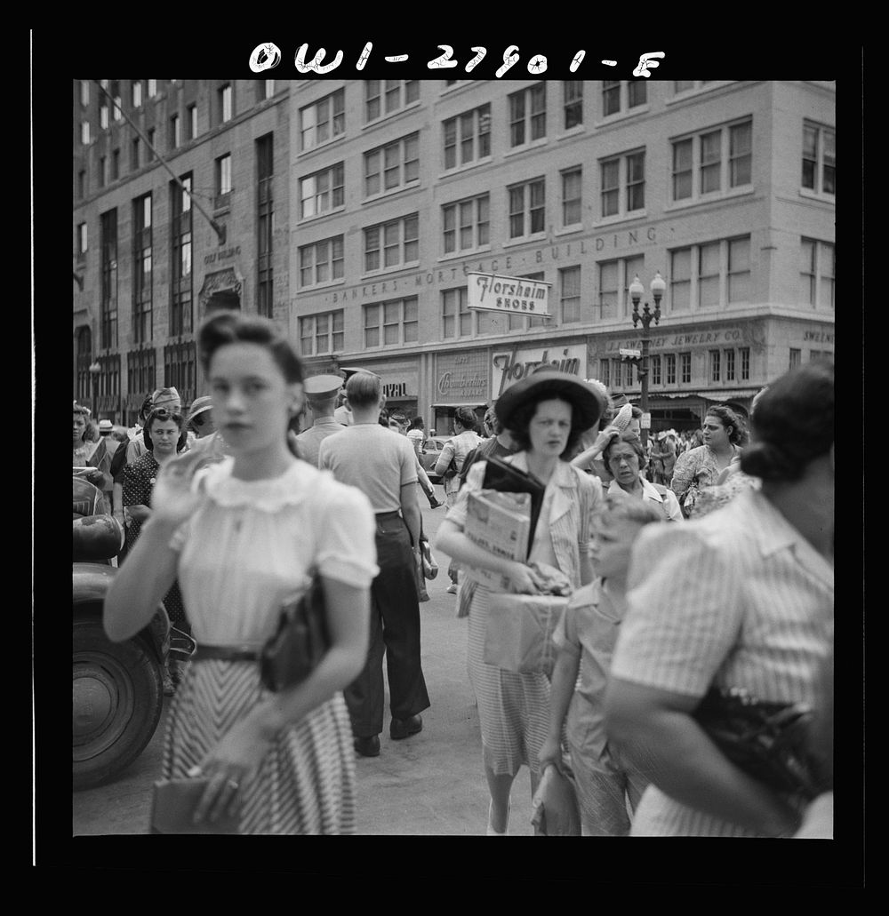 [Untitled photo, possibly related to: Houston, Texas. People crossing a downtown street with the green light]. Sourced from…