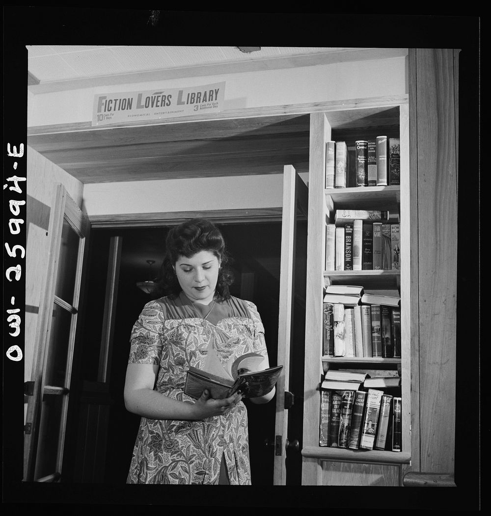Arlington, Virginia. Lending library in the service shop at Idaho Hall, Arlington Farms, a residence for women who work in…