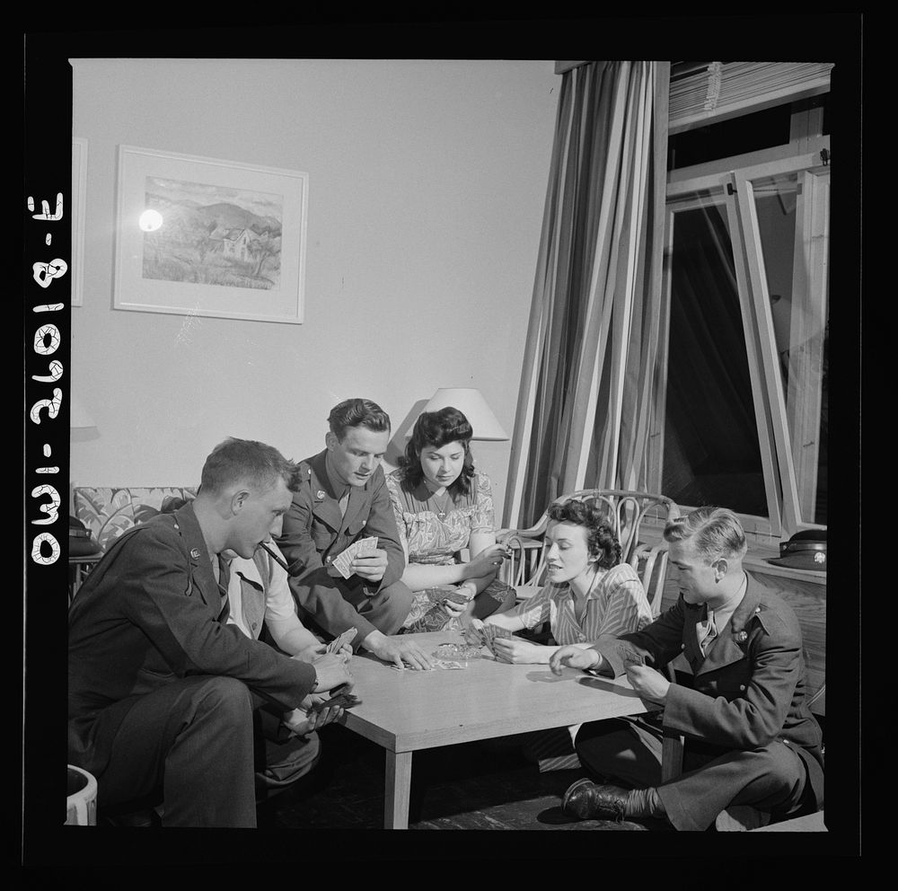 Arlington, Virginia. Girls entertaining their guests in one of the two card rooms, at a residence for the women who work in…