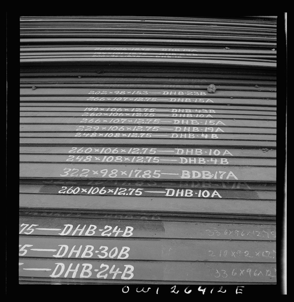 Bethlehem-Fairfield shipyards, Baltimore, Maryland. Painting identification numbers on the steel plates. Sourced from the…