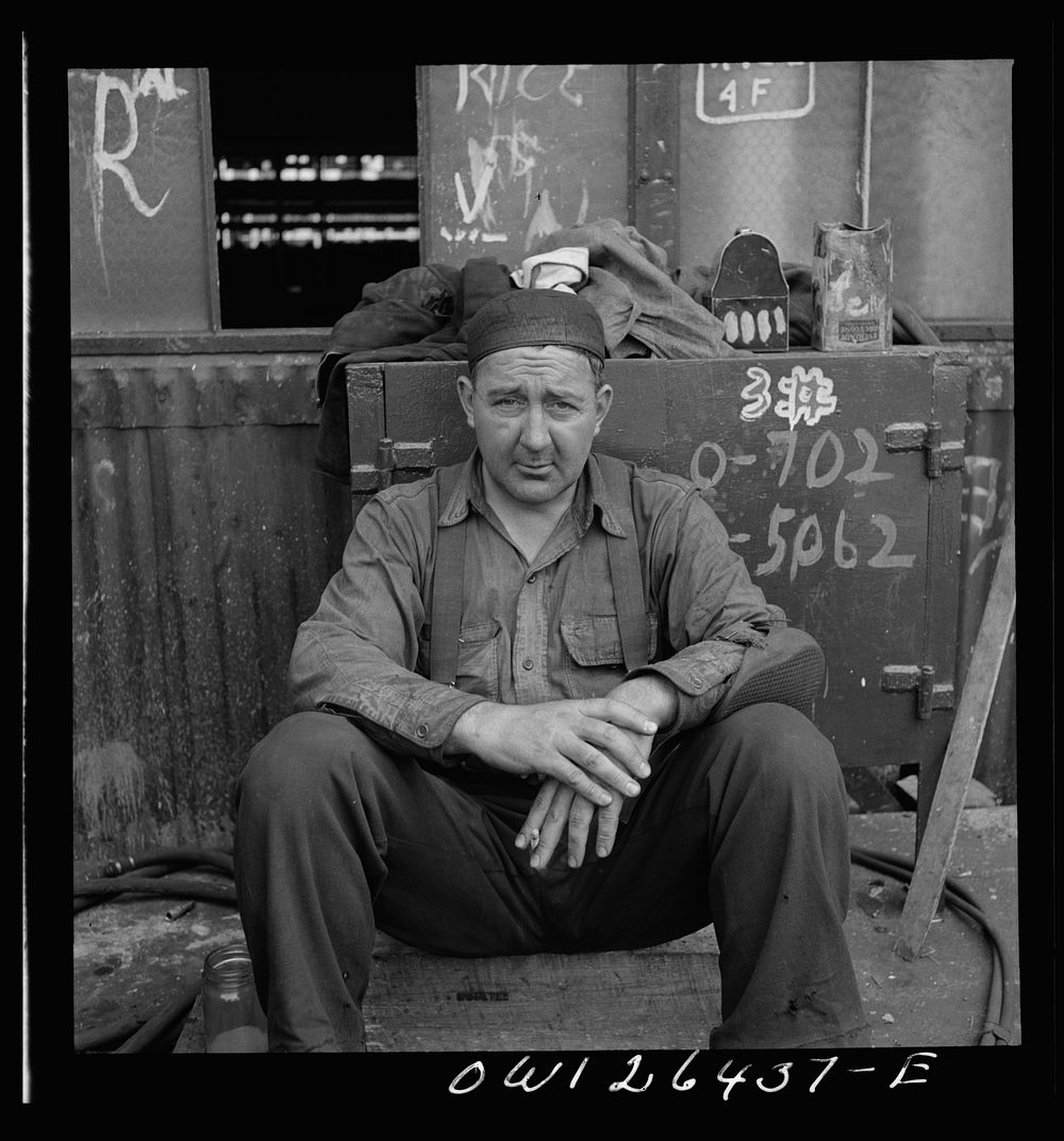 Bethlehem-Fairfield shipyards, Baltimore, Maryland. Welder during lunch hour. Sourced from the Library of Congress.
