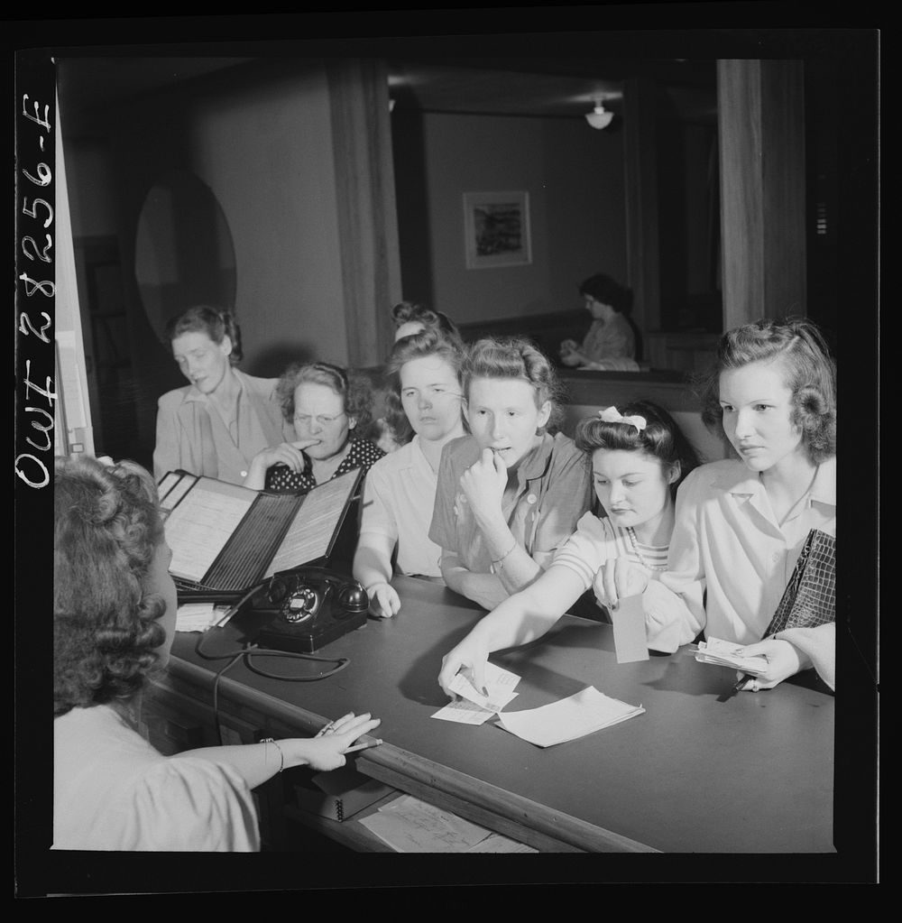 Arlington Farms, war duration residence halls. Waiting for letters at the mail desk. Idaho Hall, Arlington Farms. Sourced…