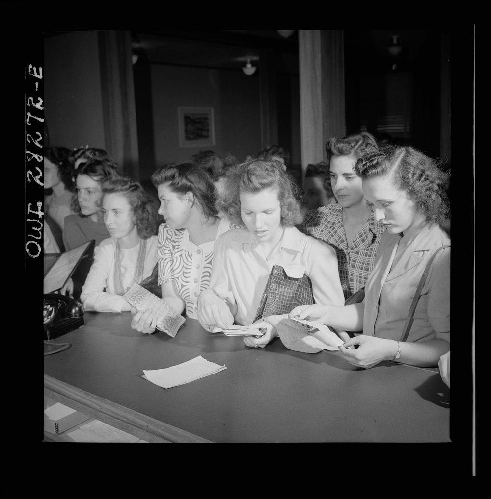 Arlington Farms, war duration residence halls. Waiting for and opening letters at the mail desk. Idaho Hall, Arlington…