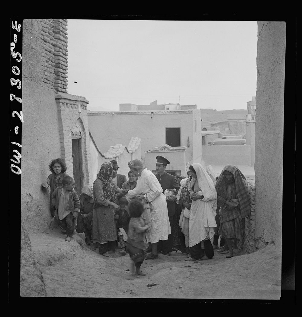 Teheran, Iran. Mrs. Louis Dreyfus, wife of the United States minister to Iran touring the poorer section of the city.…