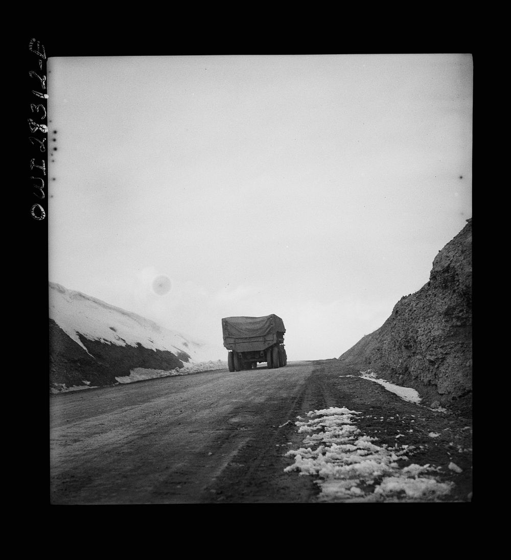 Somewhere on the Persian corridor. A United States Army truck convoy carrying supplies for the aid of Russia on a mountain…