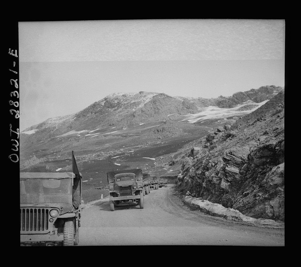 Somewhere in the Persian corridor. A United States Army truck convoy carrying supplies for the aid of Russia. Part of the…