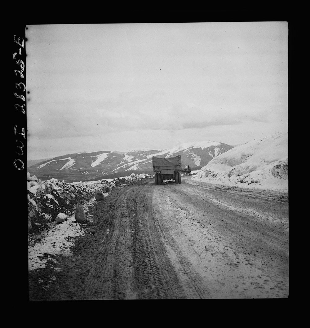 Somewhere in the Persian corridor. A United States Army truck convoy carrying supplies for the aid of Russia. A truck near…