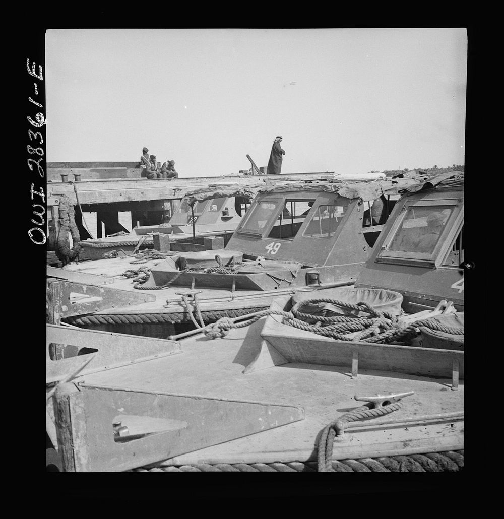 Higgins speedboats made in New Orleans in a port in the Middle East. Sourced from the Library of Congress.
