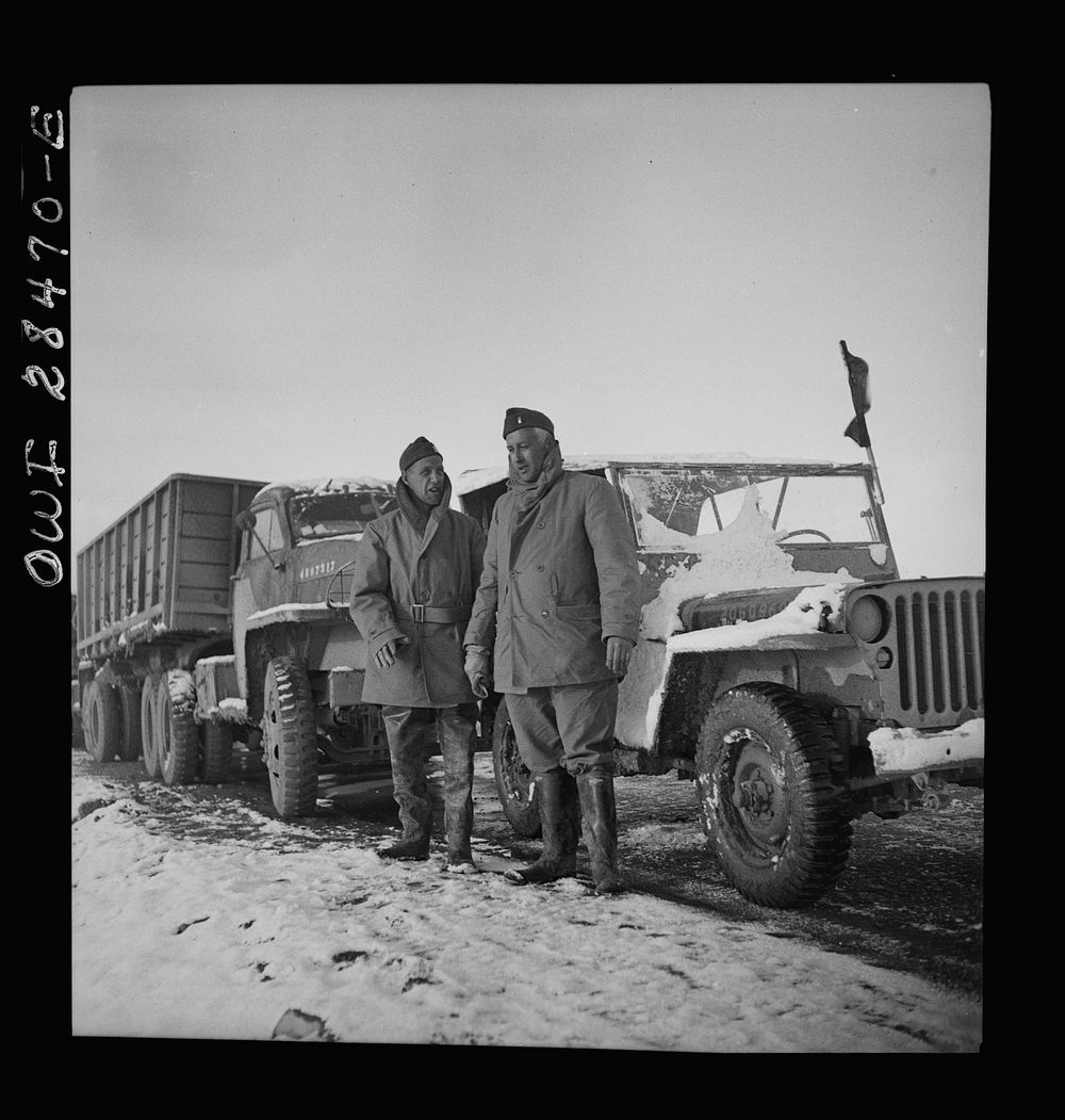 Somewhere in the Persian corridor. A United States Army truck convoy carrying supplies for Russia. Captain J. Priggee…