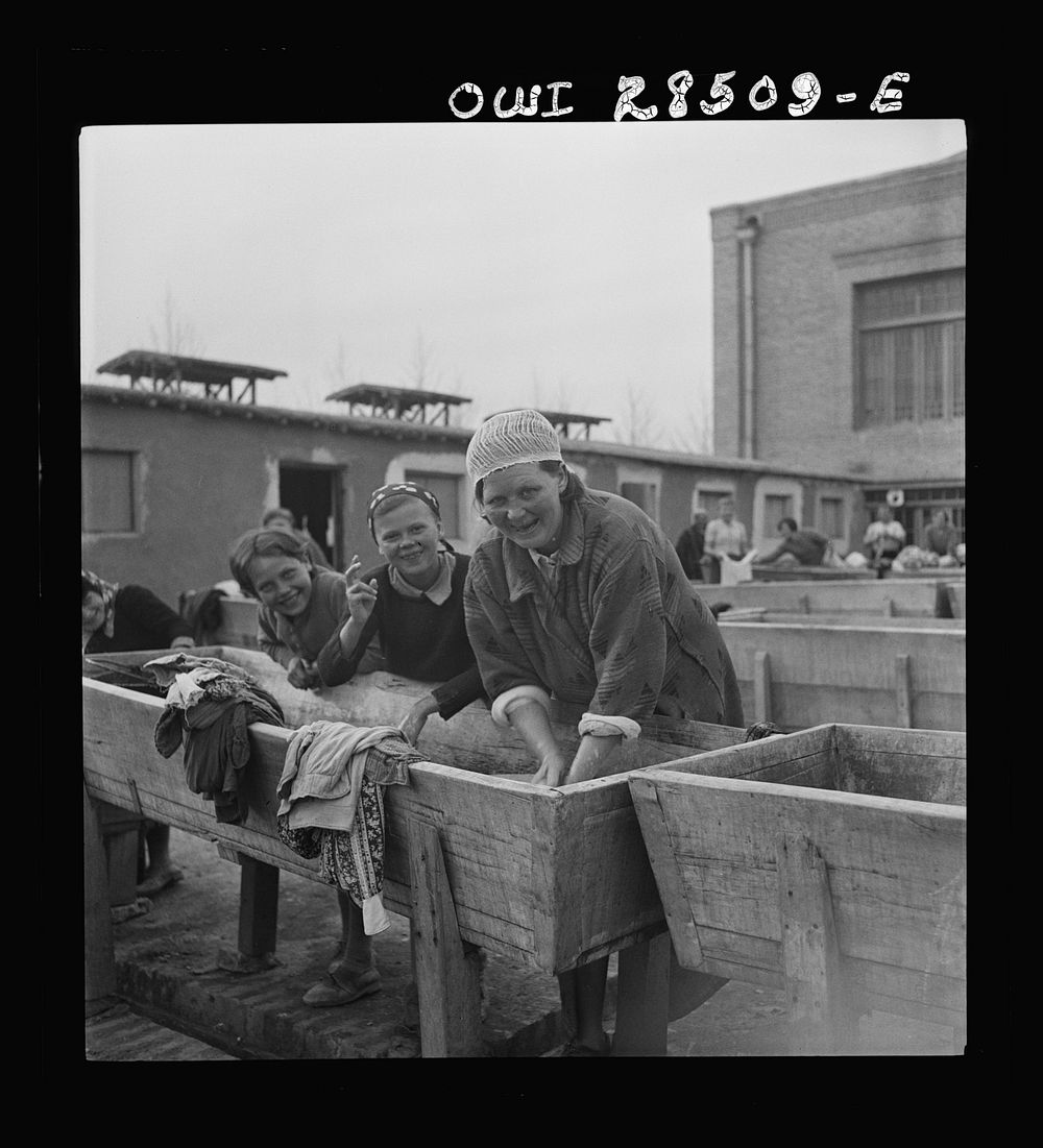 Teheran, Iran. Women doing their laundry in a Polish evacuee camp operated by the Red Cross. Sourced from the Library of…