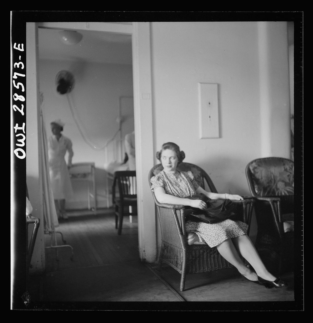 [Untitled photo, possibly related to: Washington, D.C. A blood donor enjoying a glass of water before leaving the American…