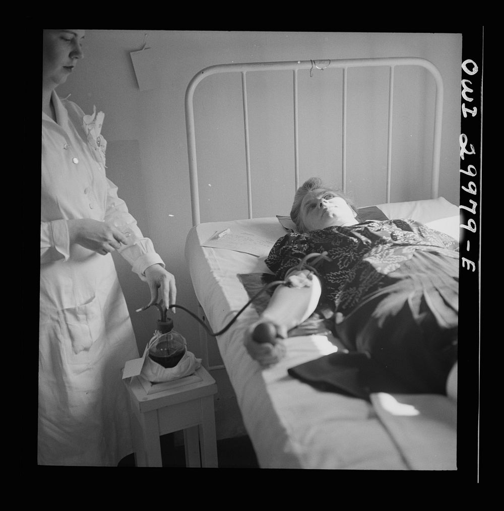 [Untitled photo, possibly related to: Washington, D.C. Blood donor at the American Red Cross blood bank]. Sourced from the…