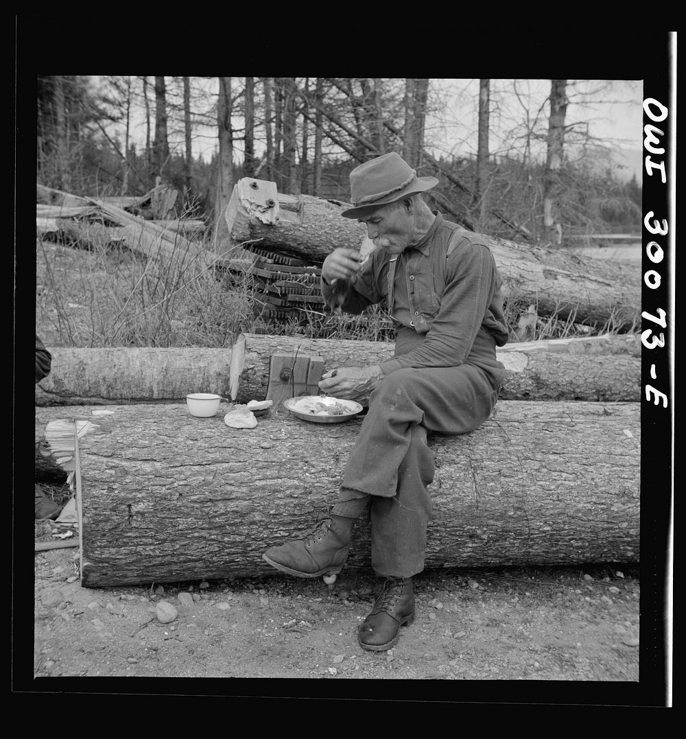 Spring pulpwood drive on the Brown Company timber holdings in Maine. Mid-afternoon "lunch" by Long Pond where woodsmen are…