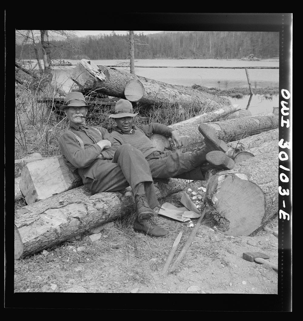 Spring pulpwood drive on the Brown Company timber holdings in Maine. Woodsmen relaxing after mid-afternoon lunch. Sourced…