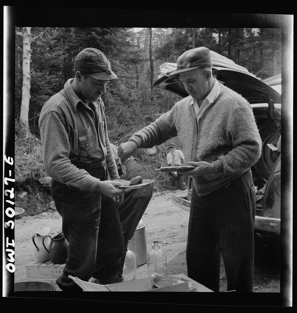Spring pulpwood drive on the Brown Company timber holdings in Maine. The cook's assistant, "Cookie" dishing out pie at mid…