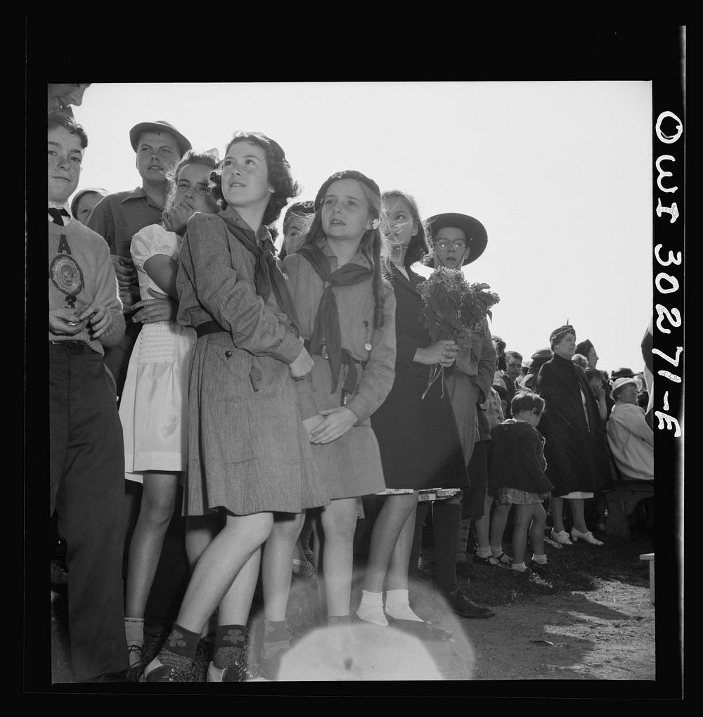 Gloucester, Massachusetts. Memorial Day, 1943. Girl scouts attending the Memorial services. Sourced from the Library of…