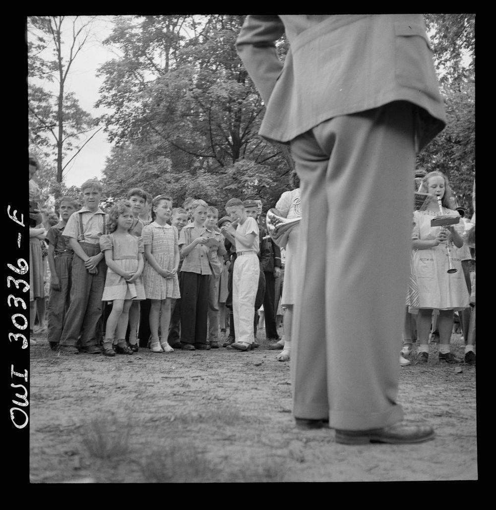 Gallipolis, Ohio. Boys and girls listening to school band at Decoration Day ceremony. Sourced from the Library of Congress.