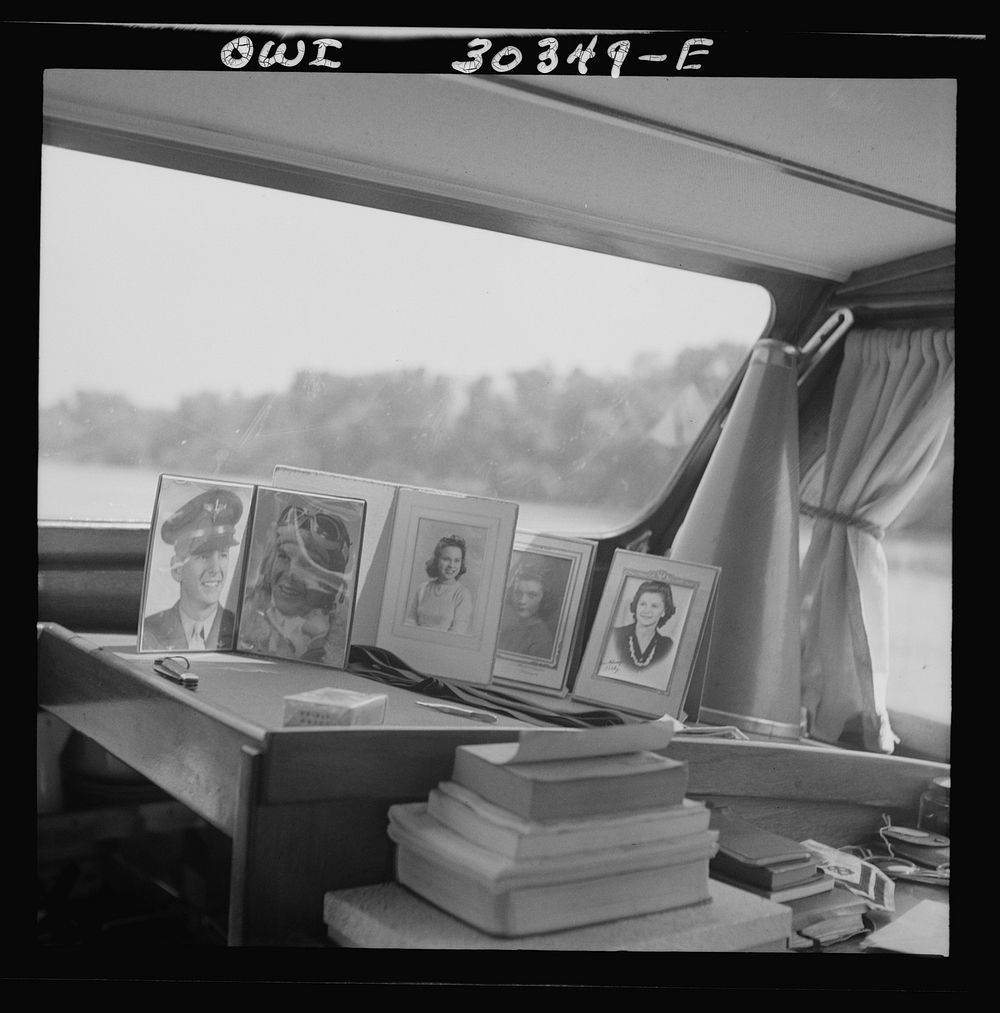 Gallipolis, Ohio. Personal photographs of boy and girl friends of Coast Guard members in Coast Guard patrol boat. Sourced…