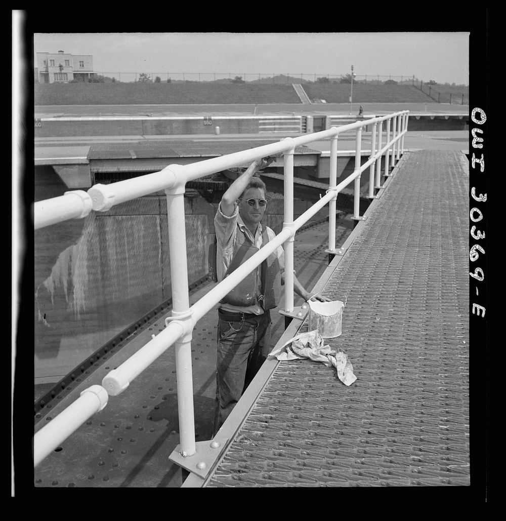 Painting walkway on top of lock gate. Sourced from the Library of Congress.