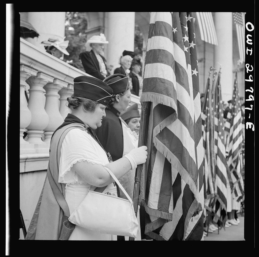 [Untitled photo, possibly related to: Arlington Cemetery, Arlington, Virginia. American Legion color bearer listening to…