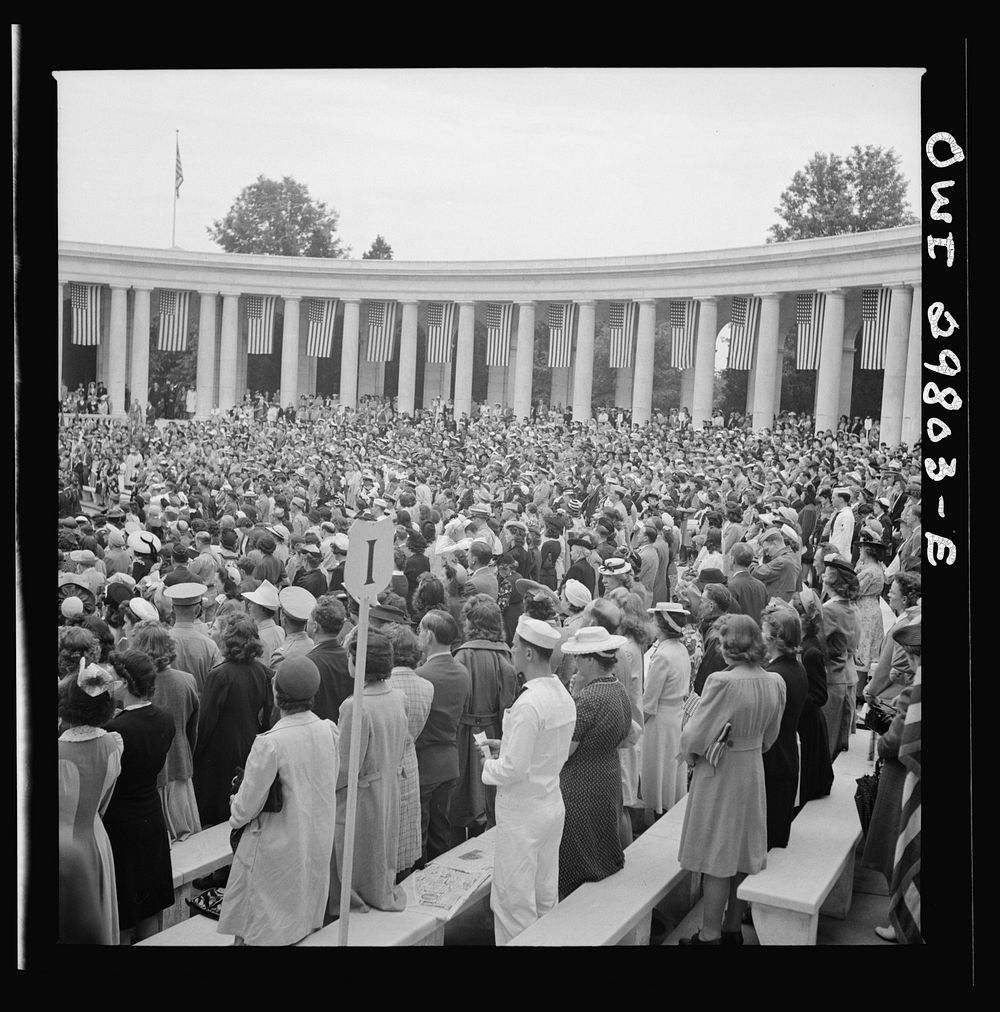 Arlington Cemetery, Arlington, Virginia. Spectators rising to sing the "Star Spangled Banner" at the Memorial Day services…